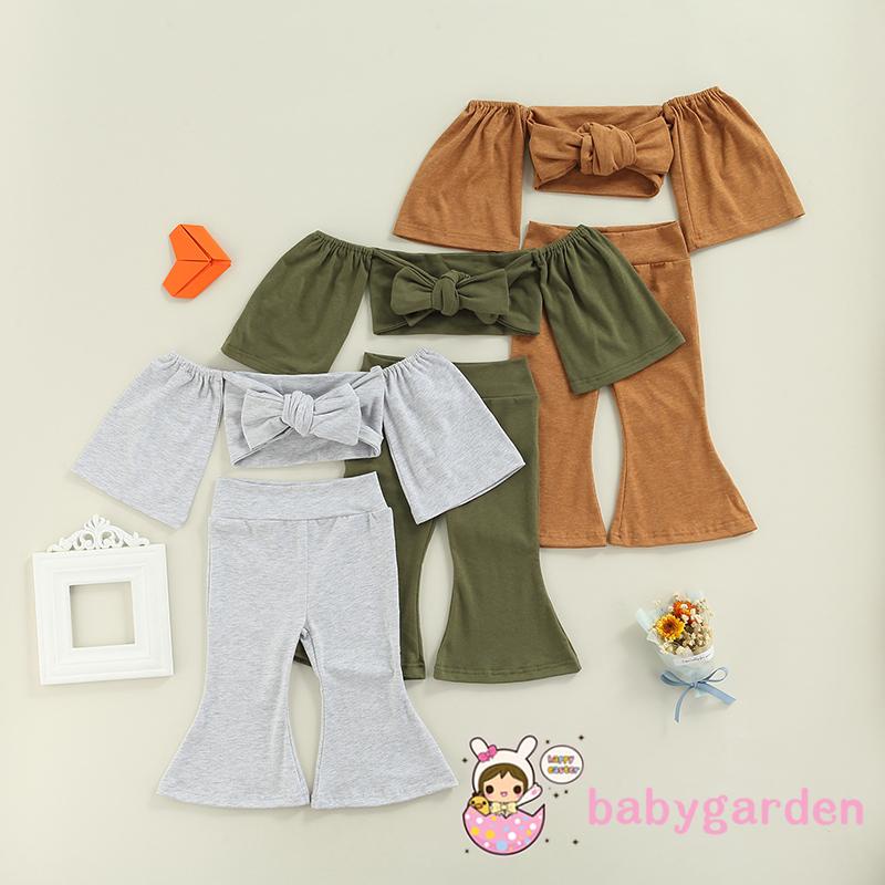 Set đồ 2 món áo croptop trễ vai thắt nơ + quần ống loe màu trơn cho bé gái