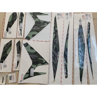 Tem exciter camo xanh lá