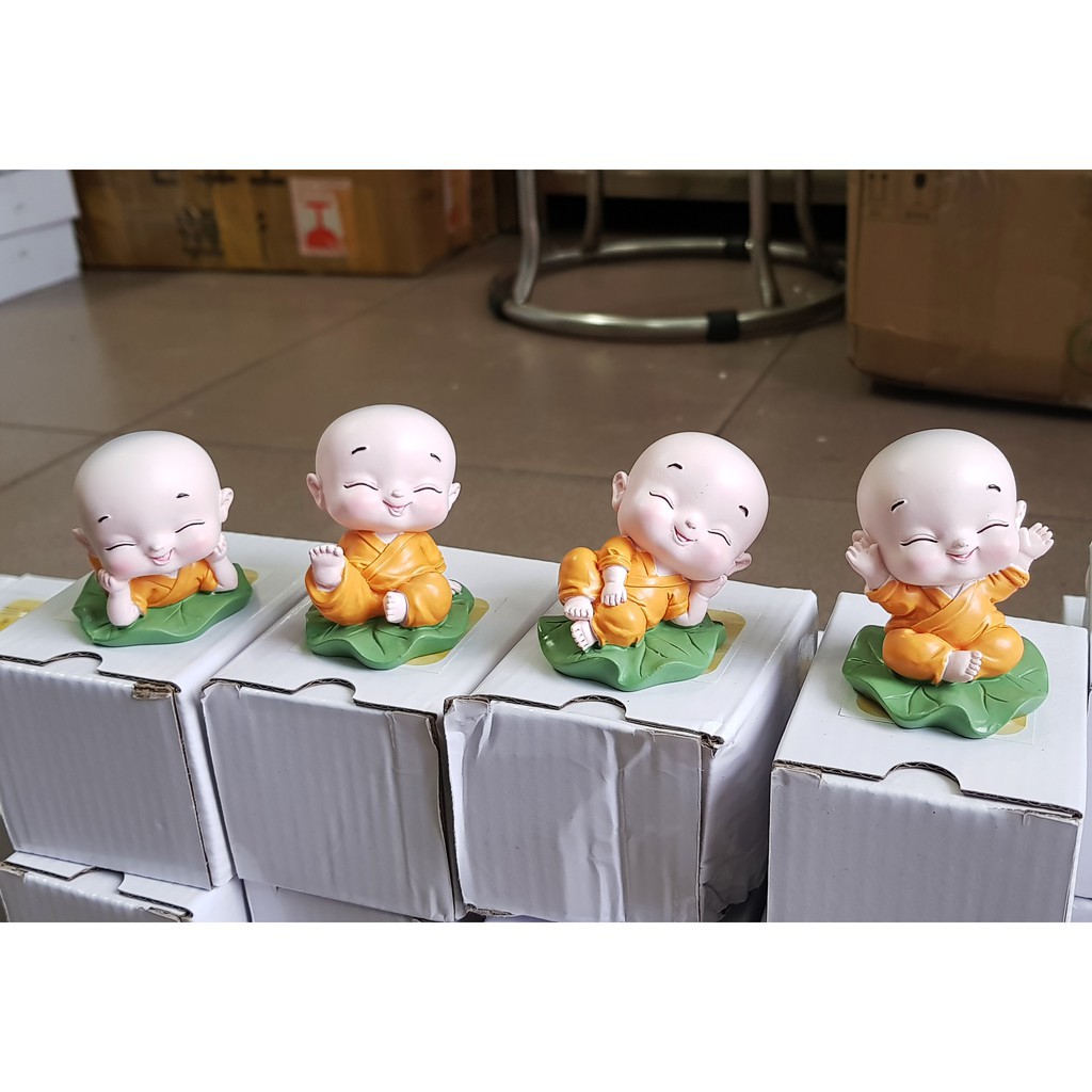 Bộ tượng chú tiểu ngồi trên lá sen thanh tịnh - Mẫu áo vàng