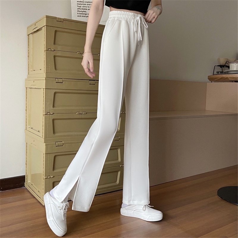 Quần dài dáng rộng lưng cao với thiết kế xẻ tà phối dây rút thời trang cá tính