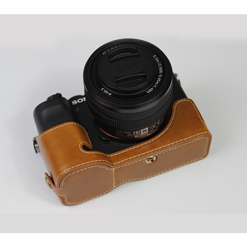Bao Da PU Bọc Máy Ảnh Sony A7C Alpha 7C ILCE-7C Kèm Pin Mở Đáy Tiện Dụng