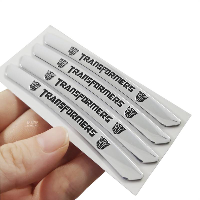 Bộ 4 Miếng Dán Trang Trí Bánh Xe Hơi Bằng Nhôm Hình Chữ Transformer
