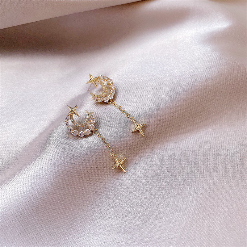 Moon And Star Shaped Metal Earrings With Diamonds