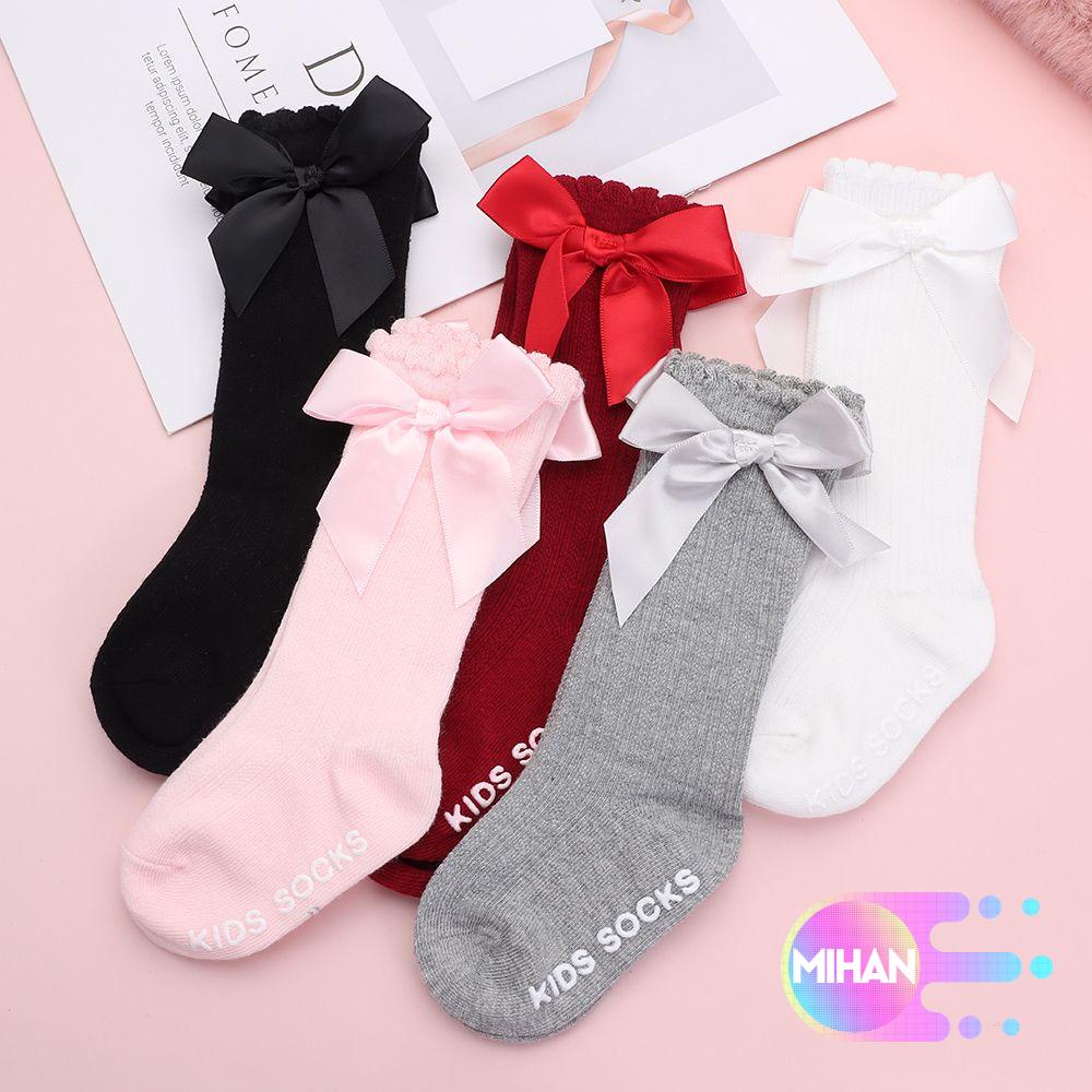 1 đôi vớ cotton dài mềm mại chống trượt phối ren đính nơ xinh xắn cho bé gái