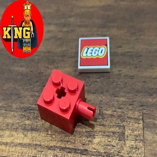 Lego red brick, modified 2 x 2 with pin and axle hole