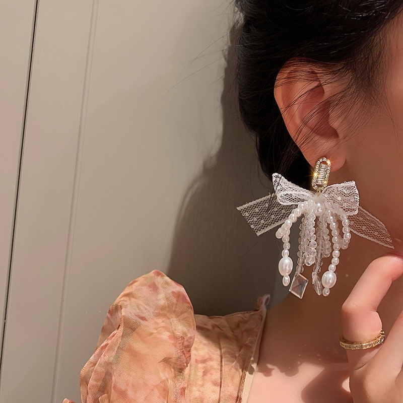 Khuyên tai bạc 925 phối nơ đính đá zircon và ngọc trai nhân tạo thời trang