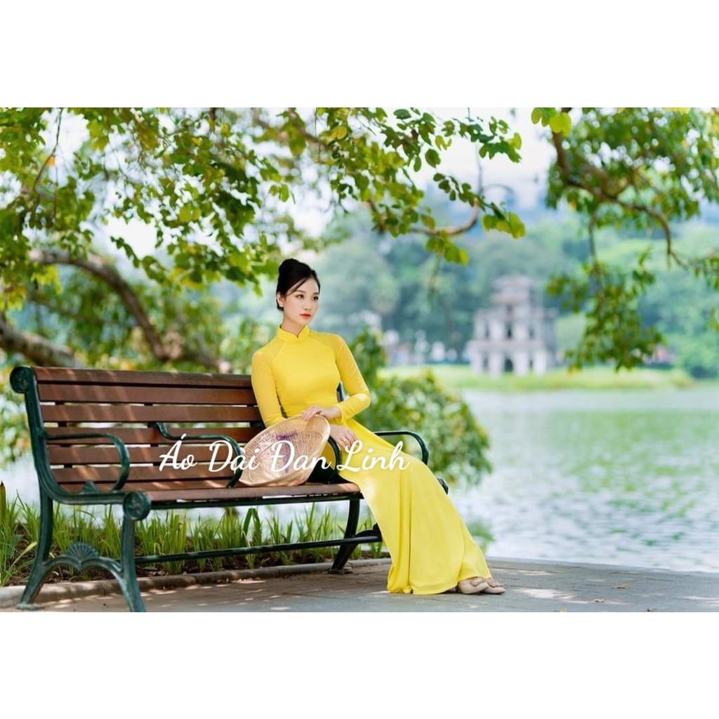 Áo dài trơn 4 tà màu vàng tôn da trẻ trung - Áo Dài Đan Linh