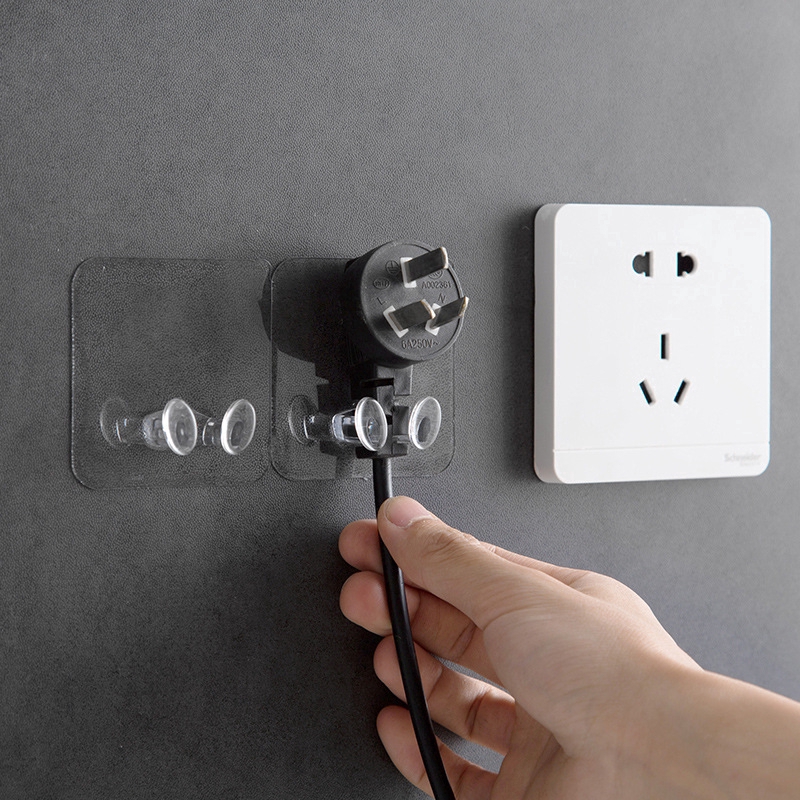 Móc dán tường treo phích cắm điện tiện dụng