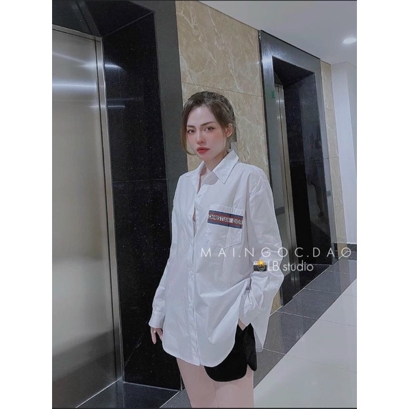 Áo sơ mi thô in lưng chữ D sao