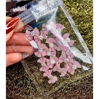 Nơ bột gắn móng trang trí móng