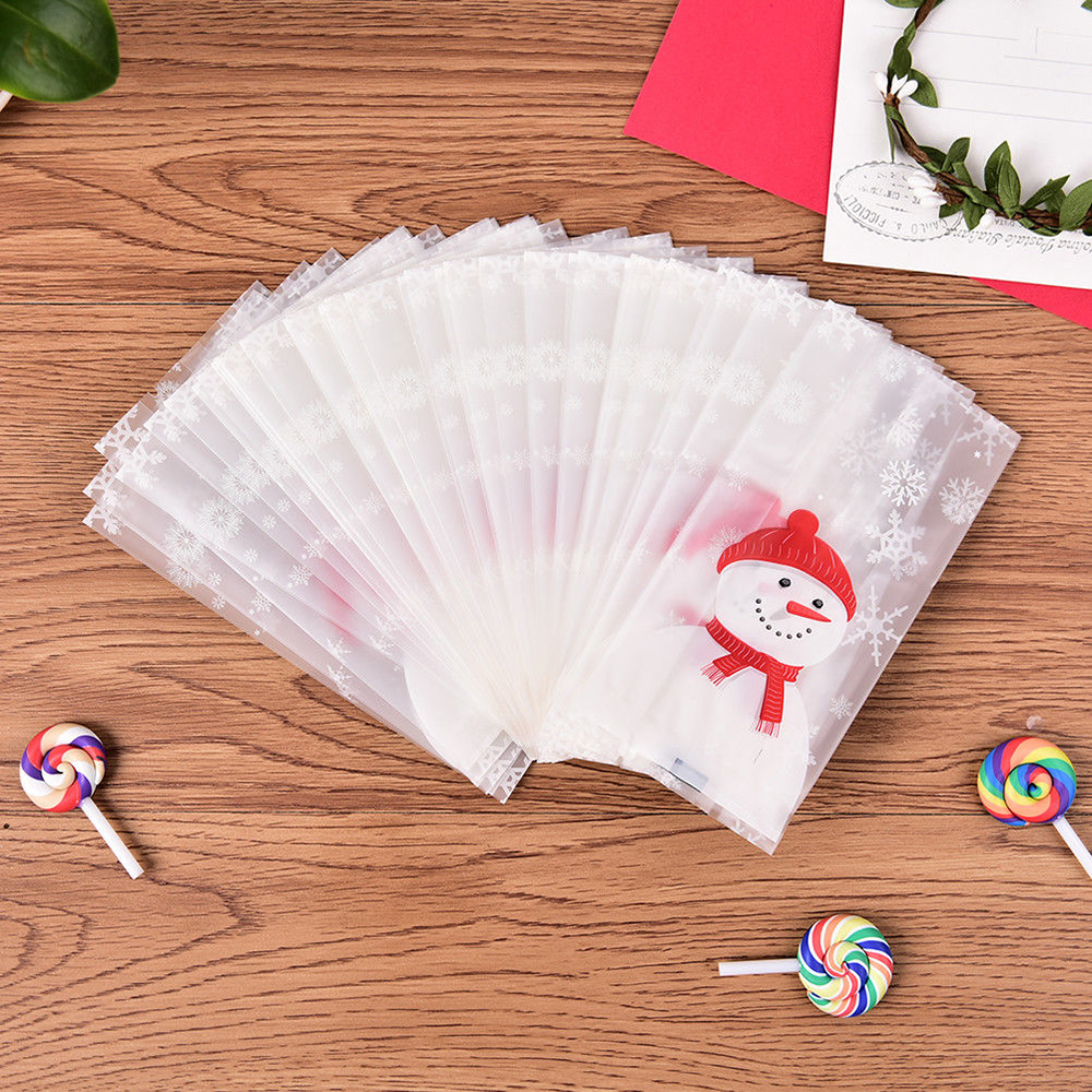 Set 50 Túi Nhựa Đựng Kẹo Giáng Sinh Tự Dính Hình Người Tuyết Dễ Thương Cho Trẻ Em