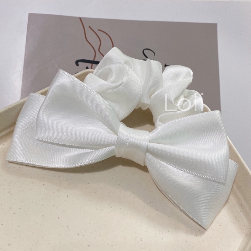 Cột tóc cao su đính nơ màu trơn đơn giản Loli