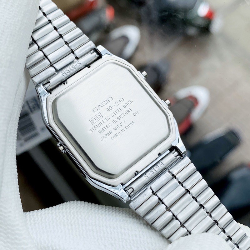 Đồng hồ kim điện tử nam nữ Casio AQ 230 silver mặt đen