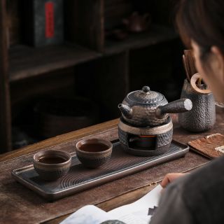 Free ship- Bộ ấm chén pha trà gốm sứ đốt nến kiểu Nhật( Combo + 5 viên nến)