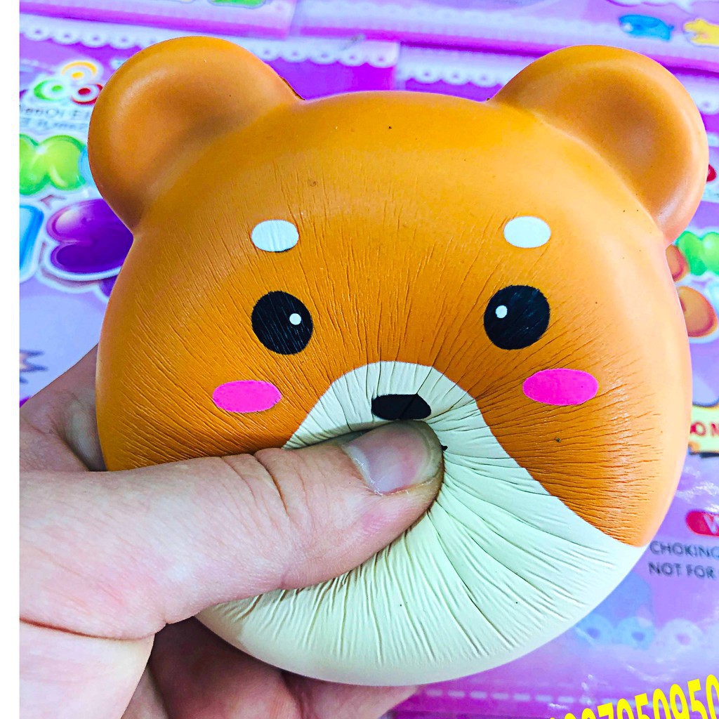 Squishy đồ chơi bánh mặt gấu lè lưỡi kèm bao suy bì
