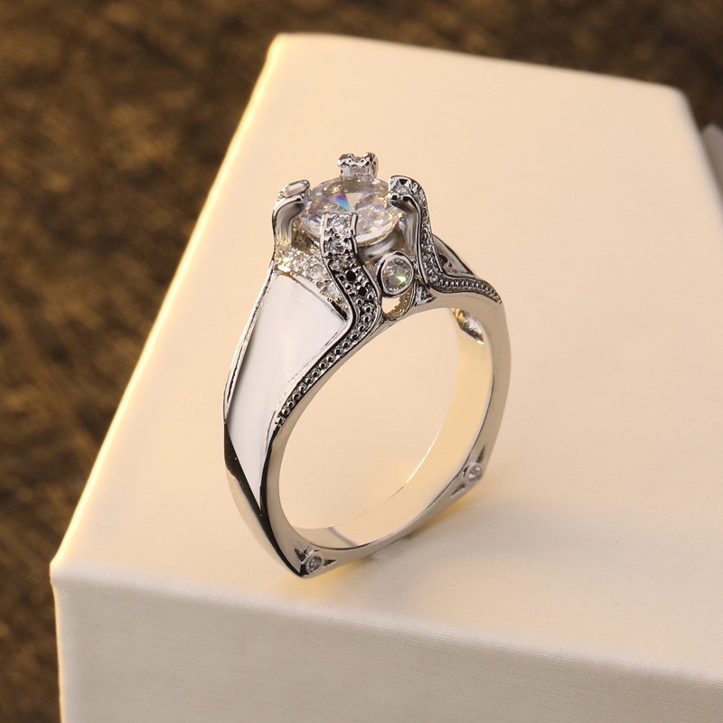 Nhẫn đeo tay kim loại hình vương miện đính đá xinh xắn cho nữ