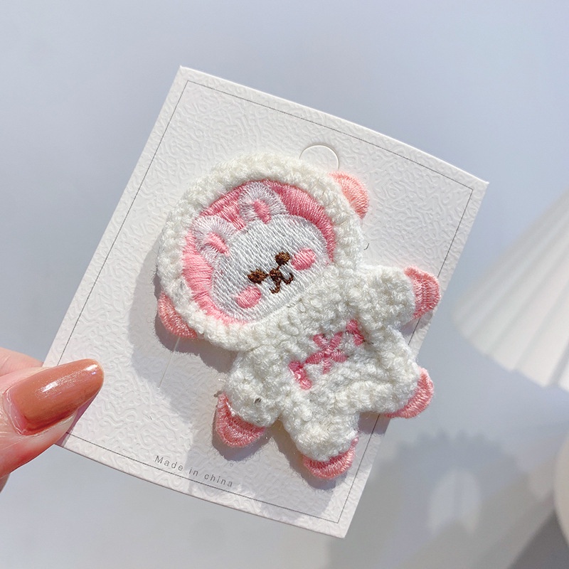 Kẹp tóc hình phi hành gia nhồi bông kiểu dáng dễ thương