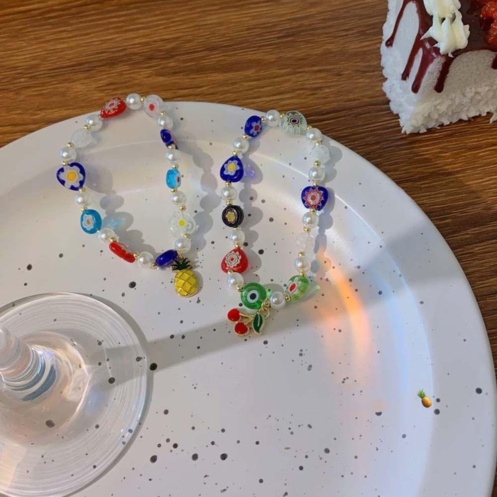 Vòng Tay Chuỗi Hạt Phối Mặt Hình Hoa May Mắn Nhiều Màu Sắc WMES15H