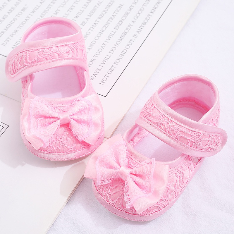 Giày đế mềm chống trượt đính nơ xinh xắn cho bé gái tập đi