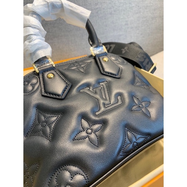 Túi lv hến cầm tay