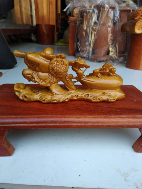 Tượng phật di lặc kéo bao gỗ thơm [ngang 40cm]