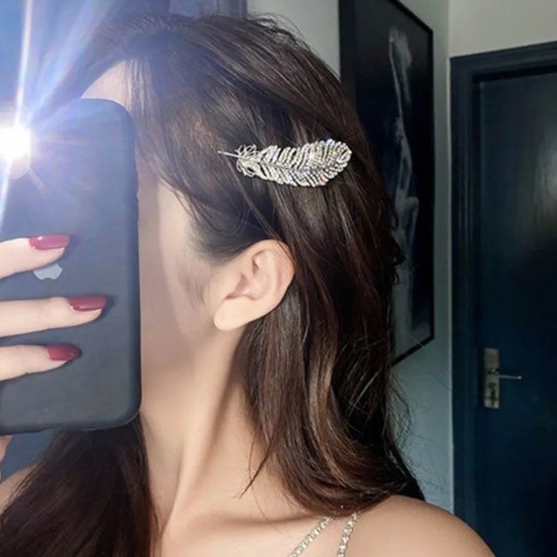 Kẹp tóc đính đá hình lông vũ kiểu dáng sáng tạo