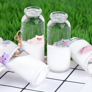 Móc khóa heo con trong bình sữa xinh xắn dễ thương