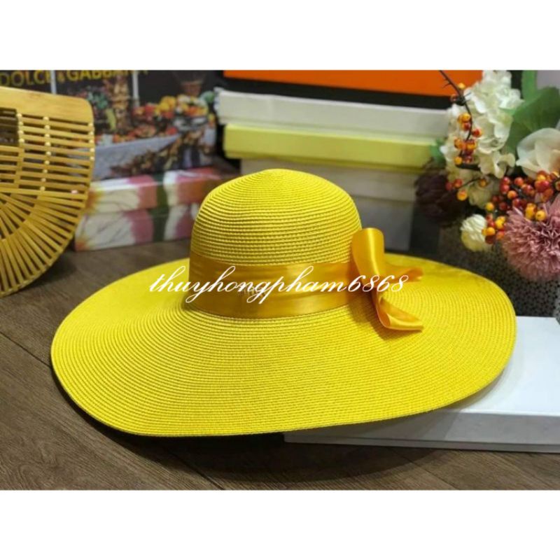 Mũ cói đi biển vành rộng dây nơ  sang chảnh