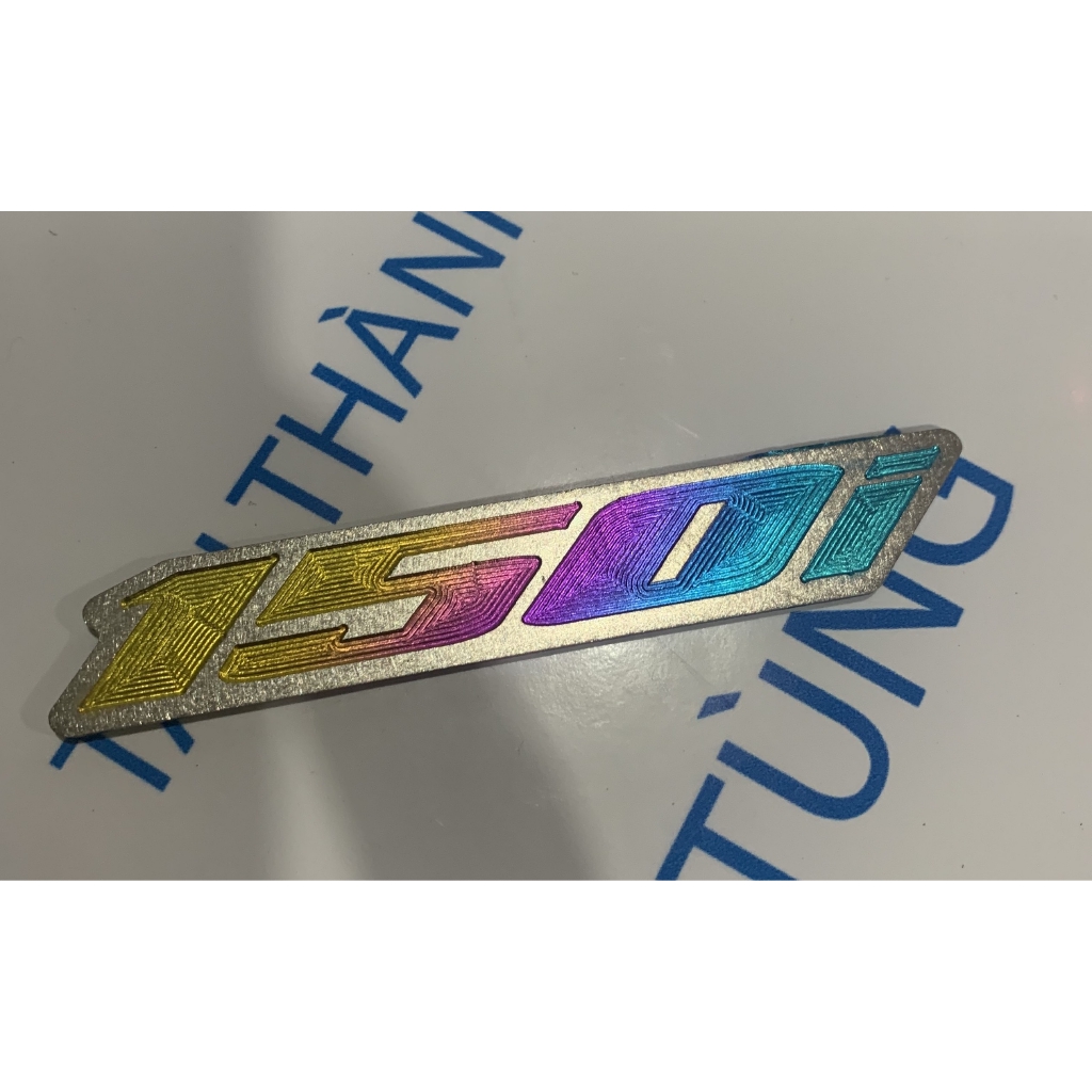 Logo Titan 150i điện phân 7 màu