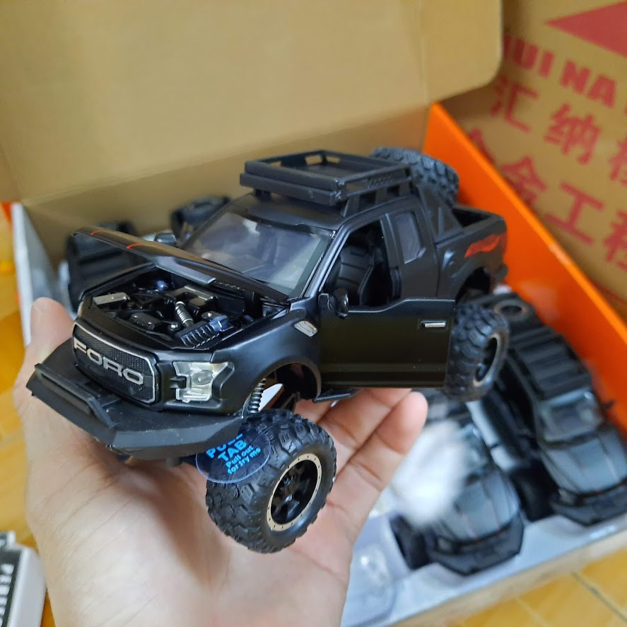 Xe mô hình Ford Offroad F150 tỉ lệ 1:32 bằng hợp kim và nhựa có đèn và âm thanh mở các cửa