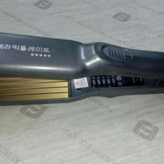 Máy dập xù tóc HQ878