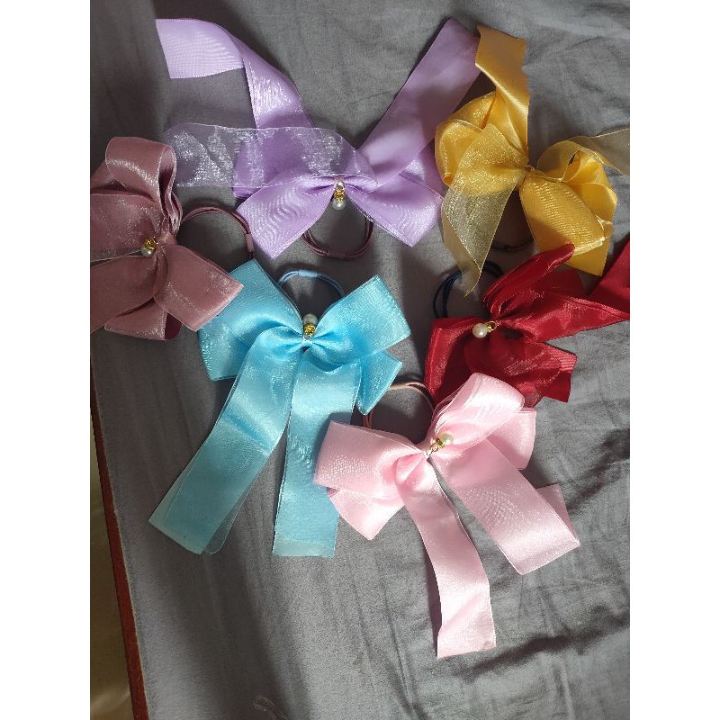 dây cột tóc nơ mẫu y hình ( màu ngẫu nhiên)