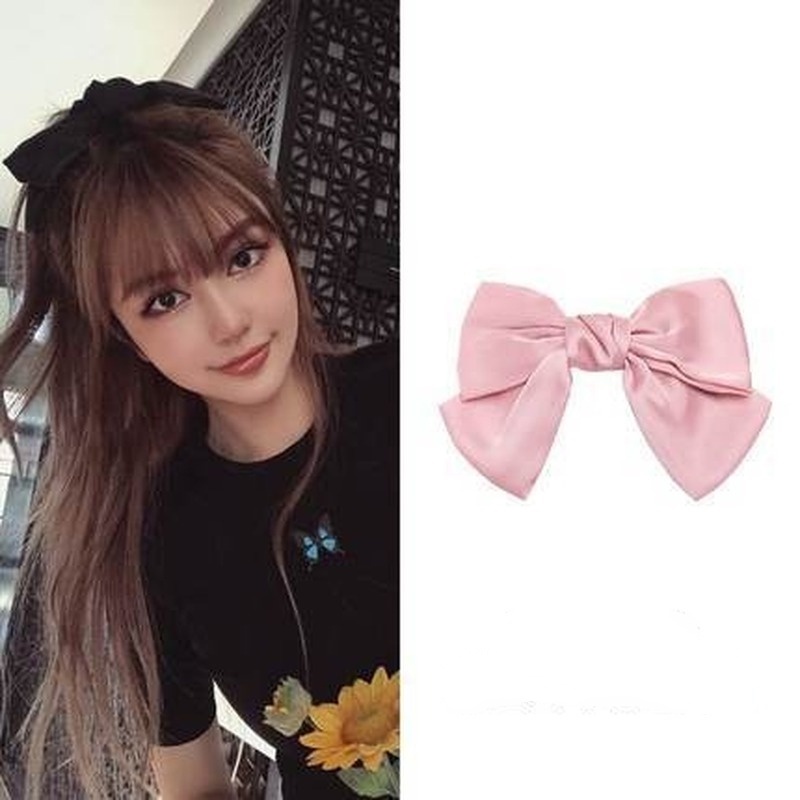 Kẹp tóc đính nơ đỏ thời trang mùa xuân xinh xắn