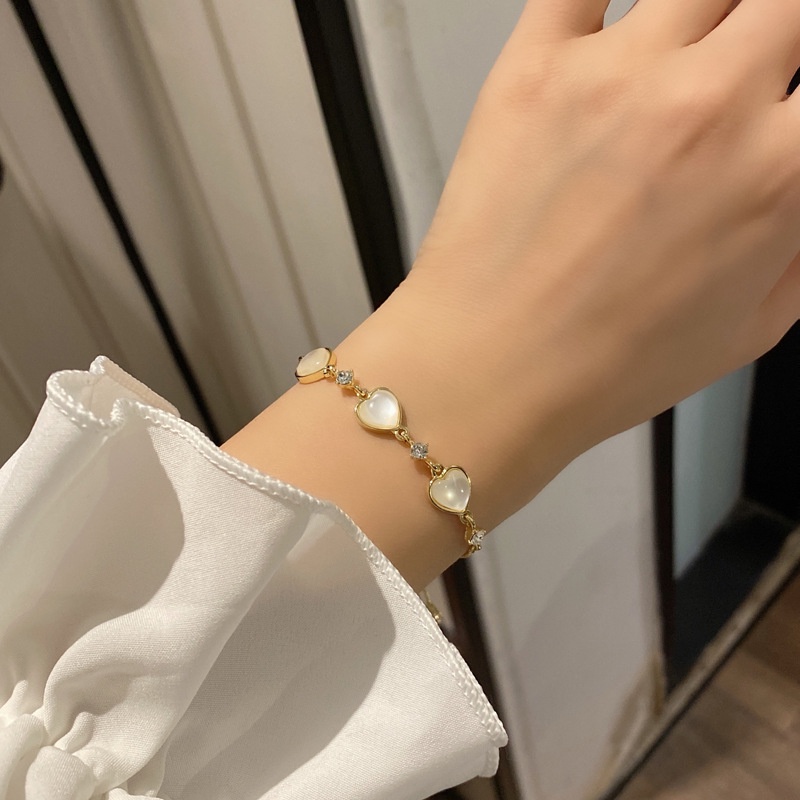 Korean fashion simple cat's eye heart shaped metal bracelet for women