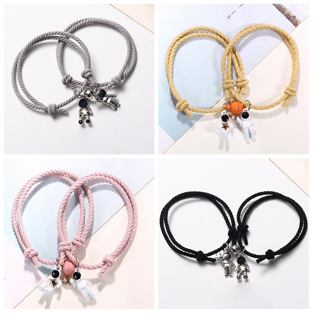 2 vòng tay nam châm họa tiết phi hành gia xinh xắn dành cho nam và nữ