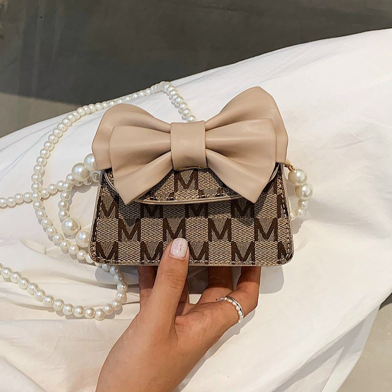 Túi đeo chéo mini đính nơ dây đeo ngọc thời trang mẫu mới 2022