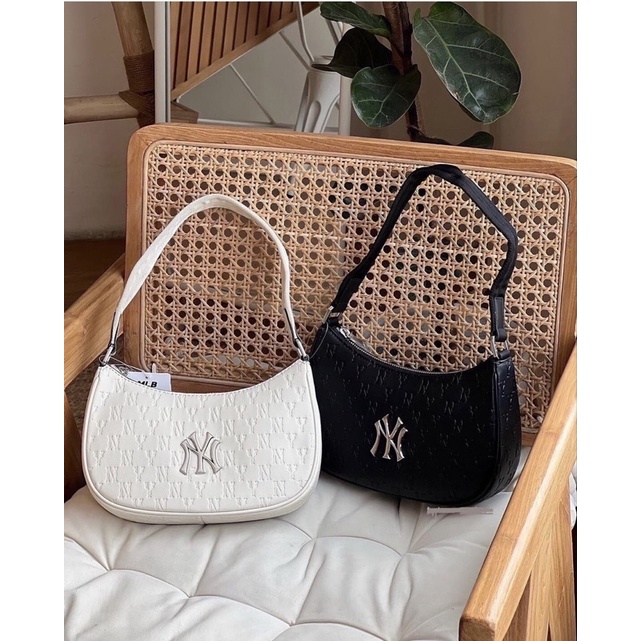 Túi kẹp nách da hoạ tiết monogram chìm