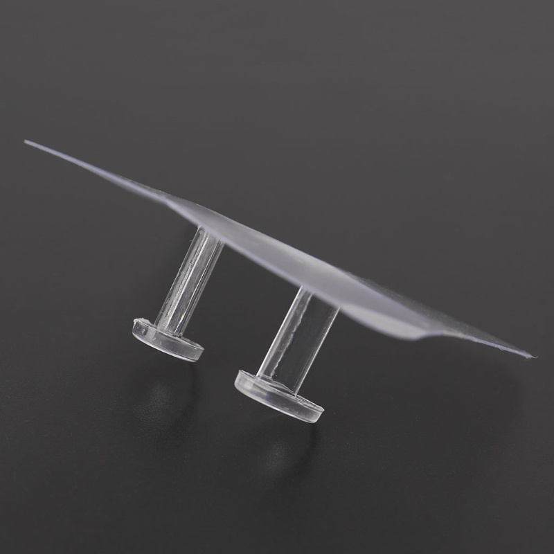 Giá đỡ phích cắm dán tường trong suốt tiện dụng