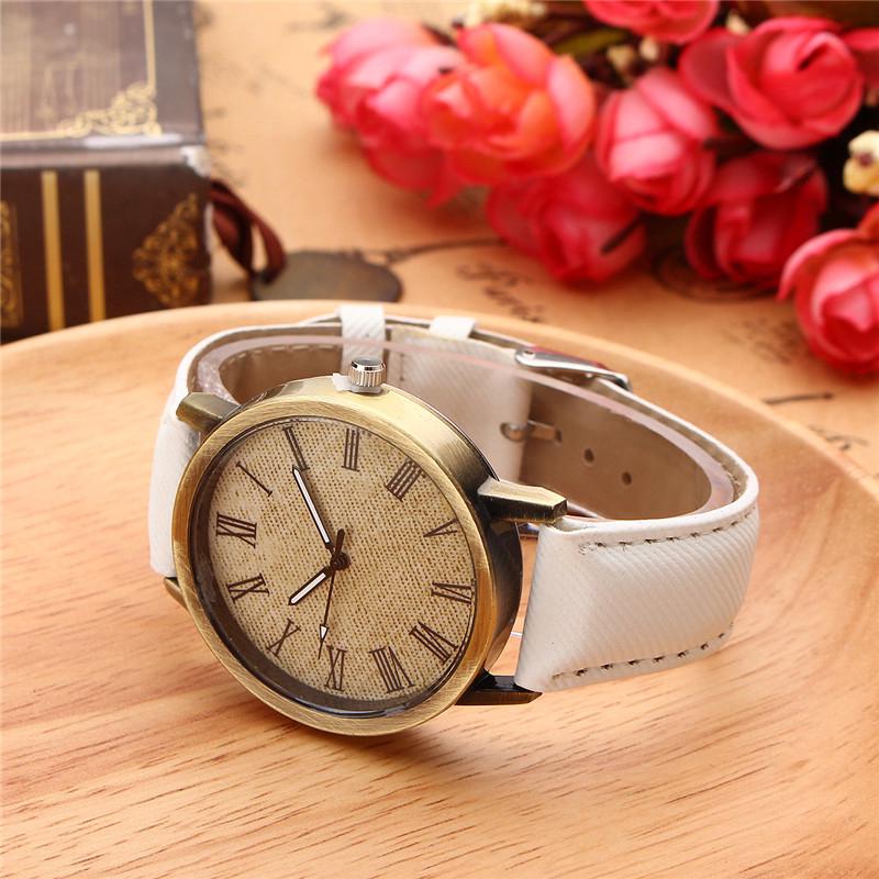 Đồng hồ analog máy quartz mặt số La Mã dây da thật