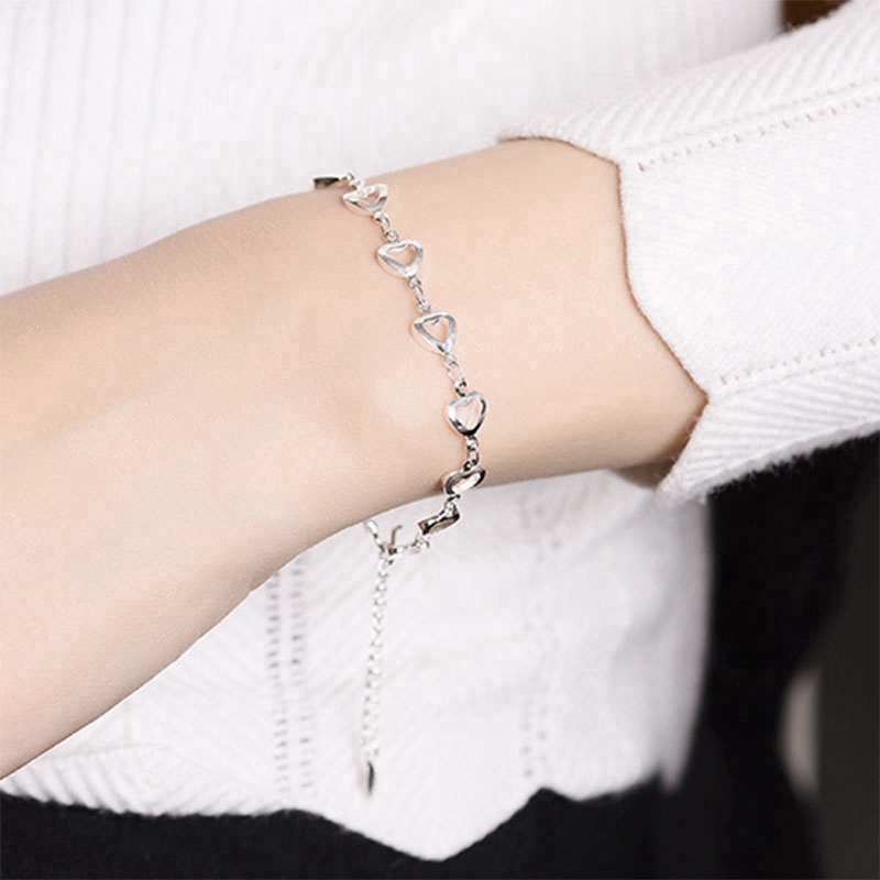 [Mã FACBHOT55 giảm 10K đơn bất kì] Vòng đeo tay họa tiết trái tim phối mắt xích phong cách Hàn Quốc màu bạc cho nữ