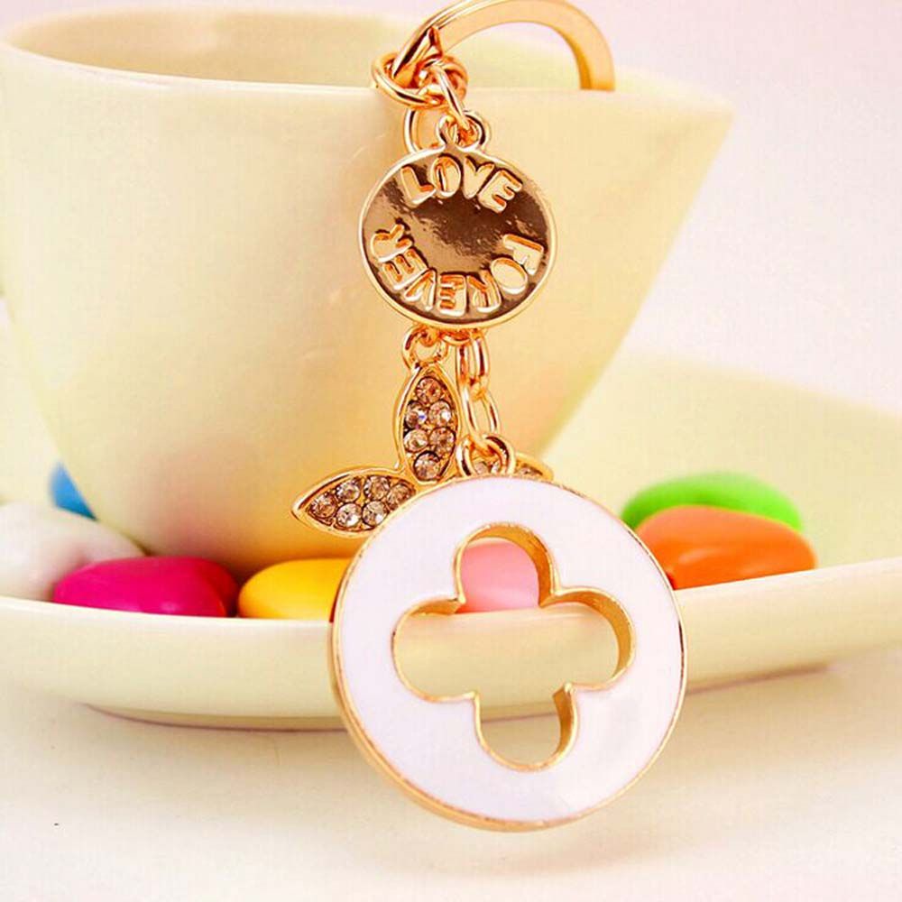 Móc Khóa Hình Cỏ Bốn Lá Bằng Kim Loại Tráng Men Nhiều Màu Thời Trang Cho Nữ