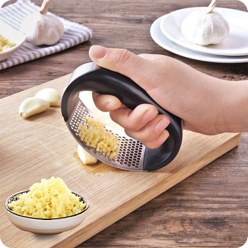 Dụng cụ ép hành tỏi cầm tay