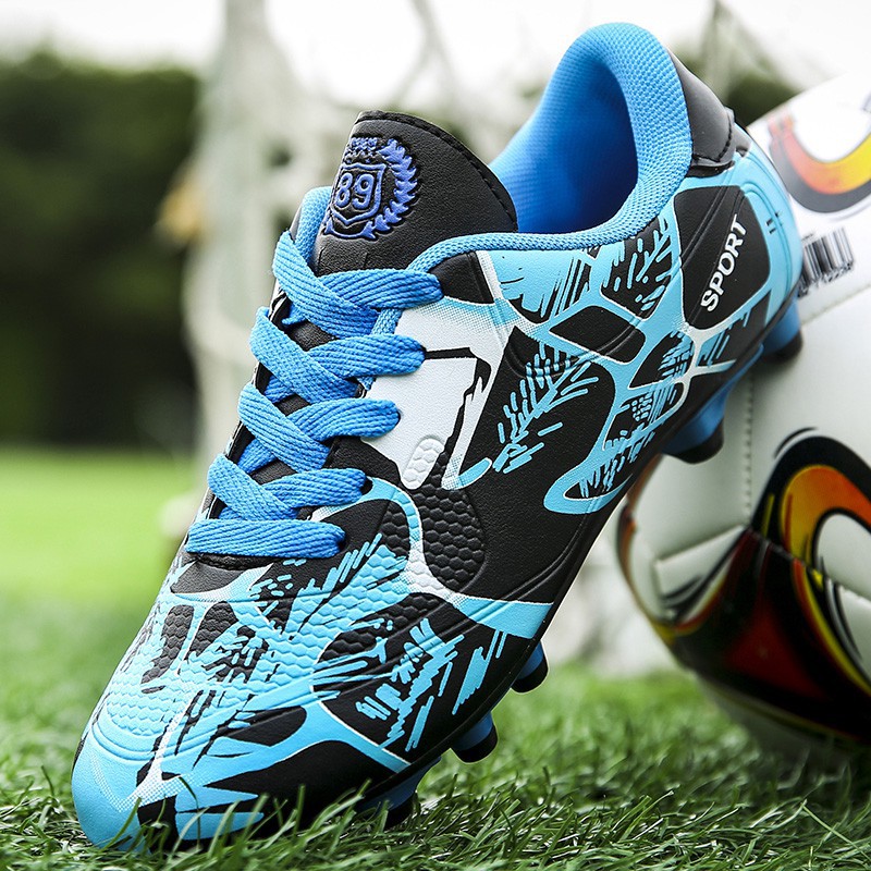 Giày đá bóng trên sân cỏ nhân tạo cho người lớn và trẻ em