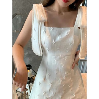 Đầm 2s trắng hoa nổi cột nơ vai