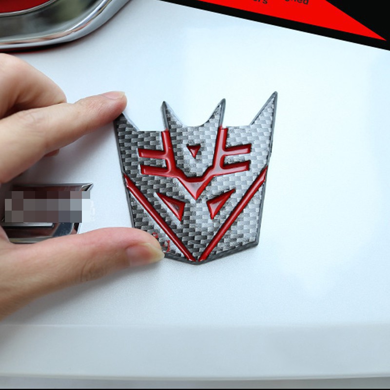 Miếng dán sợi carbon hình huy hiệu Transformer Decepticon trang trí xe hơi