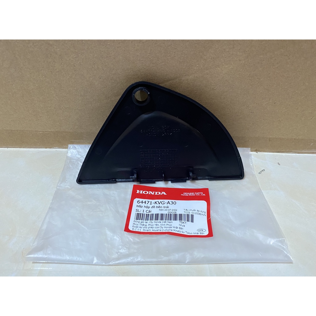 Nắp hộp đồ bên trái HONDA AIR BLADE 110 FI năm 2009-2010. 64471KVGA30
