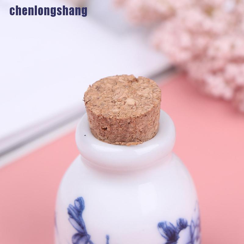 Chai bằng gốm sứ thủy tinh để đựng chất lỏng có nút bần bằng gỗ tiện dụng