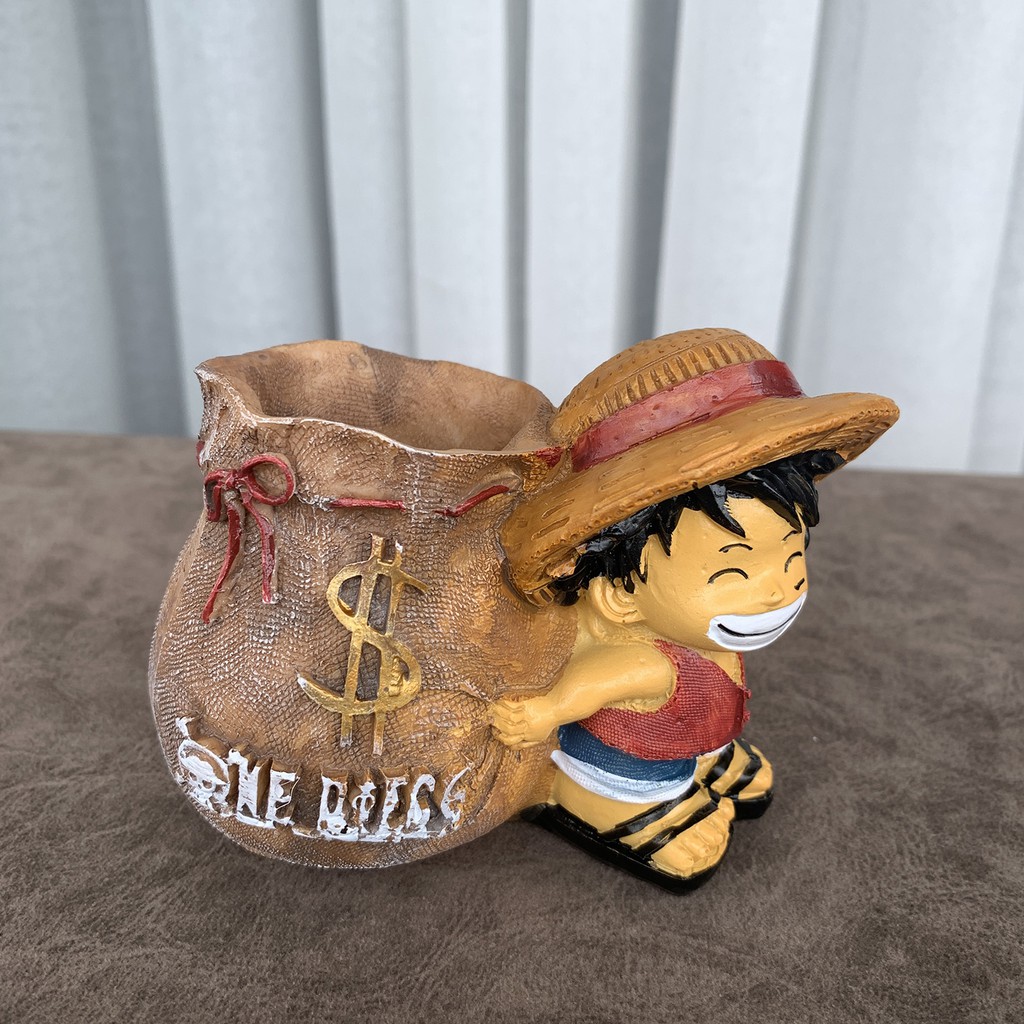 Ống đựng bút hình Luffy ôm túi tiền