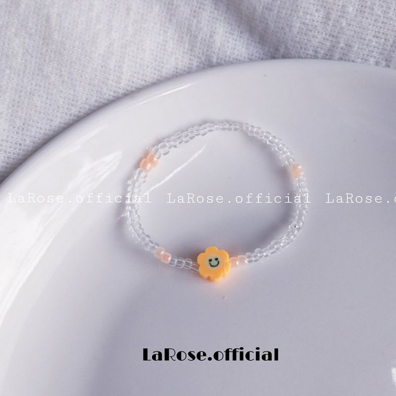 Vòng tay charm hoa sữa