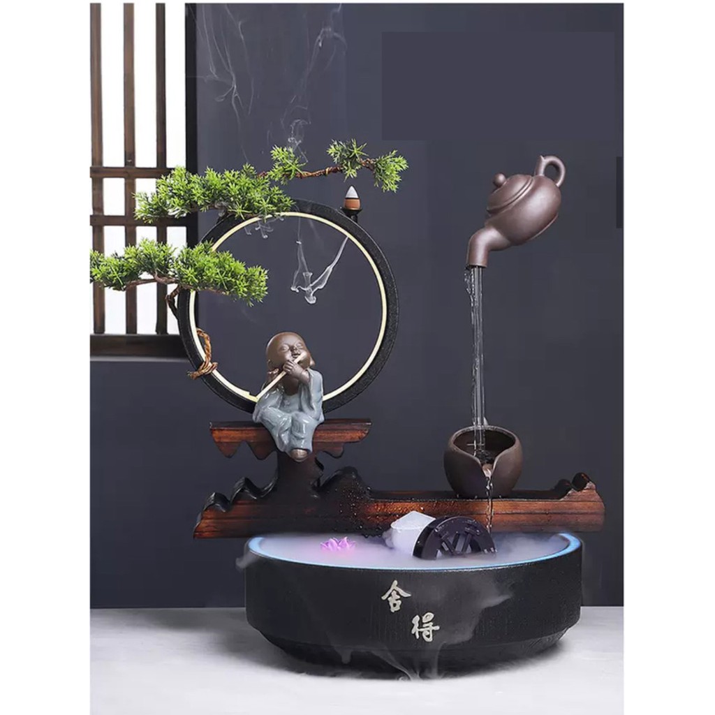 Thác nước phong thuỷ khói trầm chú tiểu thổi sáo ấm trà MS 02